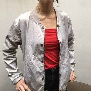 A grey brandy Melville bomber